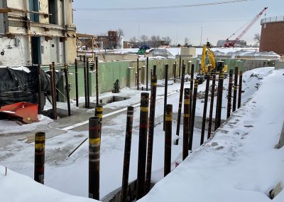 Helical pile poles in the Solids Building basement.