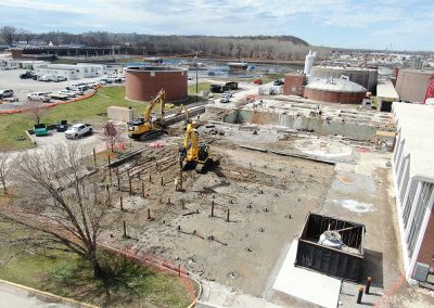 Aerial view of progress being made on helical pile installation.